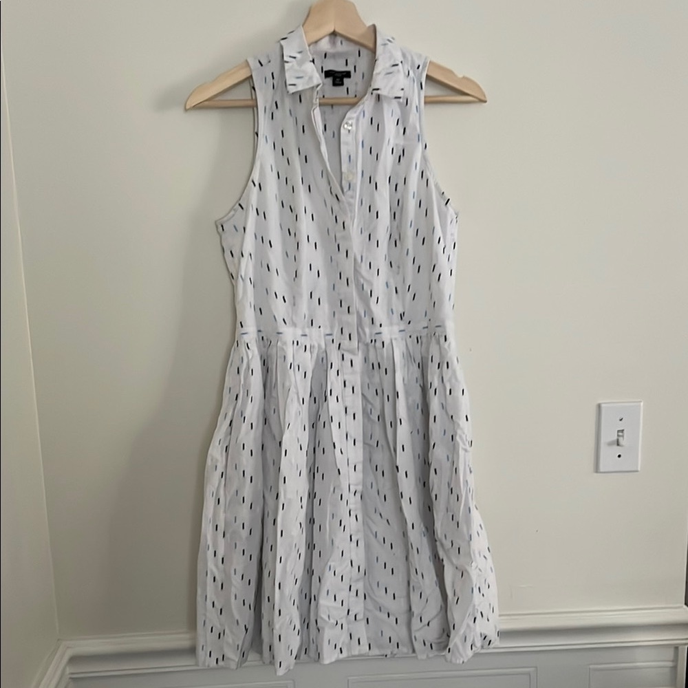 White Sleeveless Dress with Black Pattern